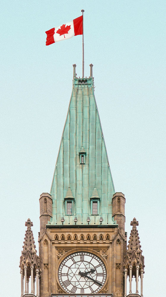 Canadian flag on Parliament Building
